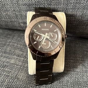 Brown Fossil watch with silver hands
